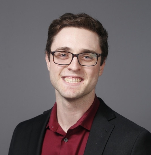 Headshot of Kieran Henderson